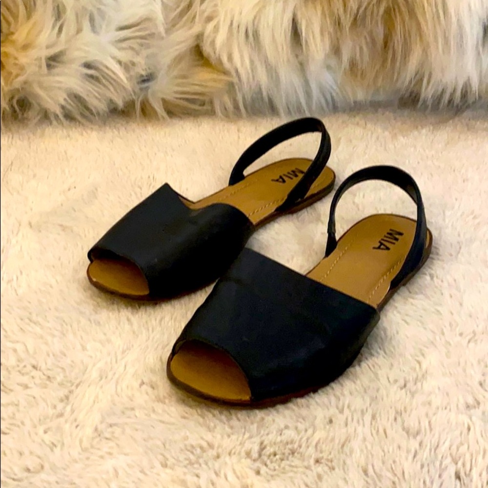Black leather flats